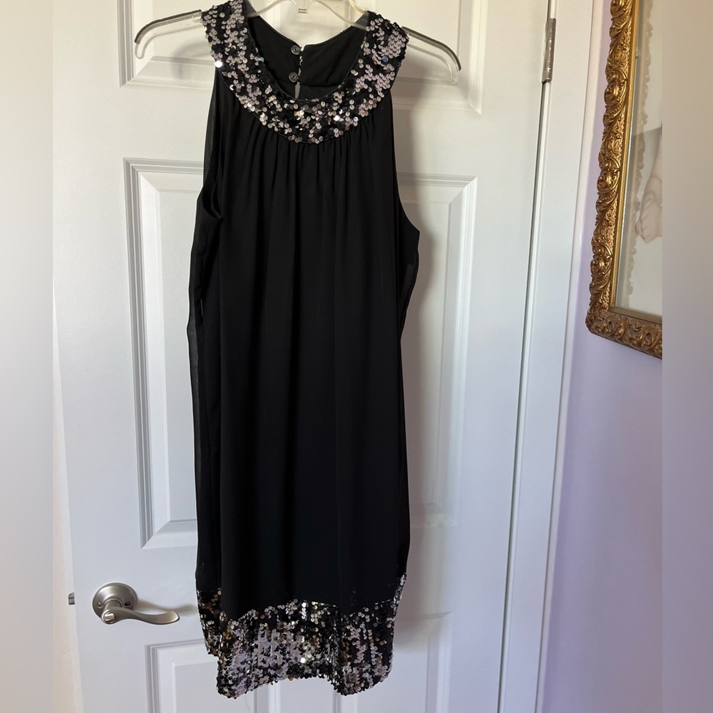 Beautiful black glam dress. Above knees. Size 14. Worn once. Wash and wear.